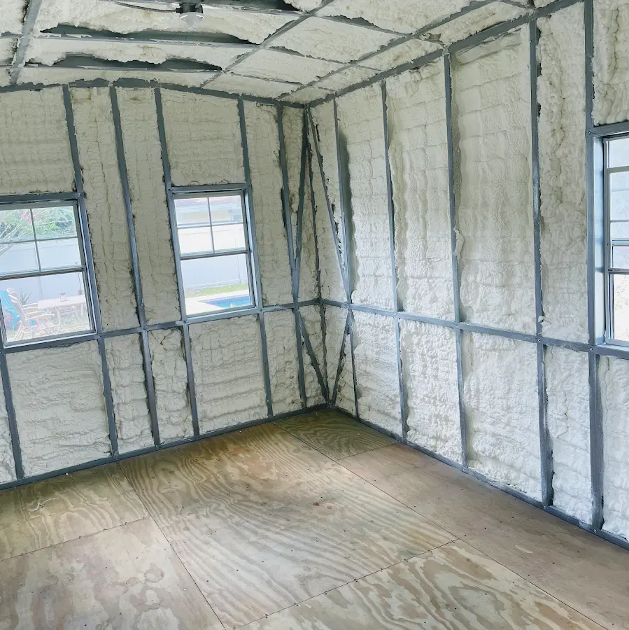 Closed-cell spray foam insulation applied to wall cavities in a residential project in EspaÃ±ola